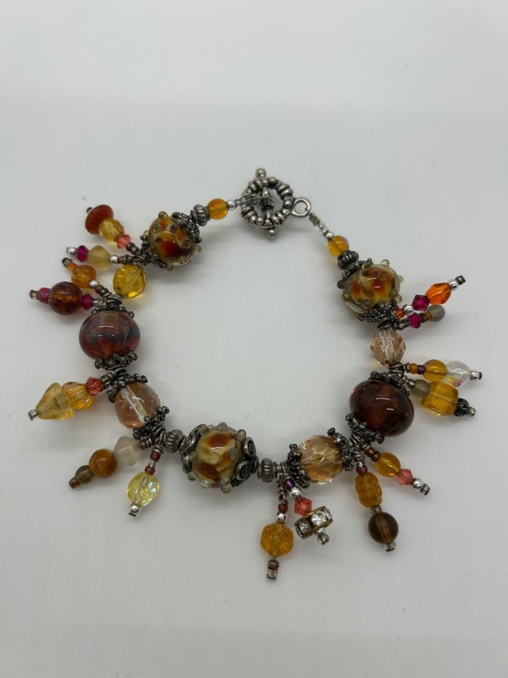 Artisan Lampwork Glass Bracelet Honey Color Gold Tone Swirl Faceted Beads